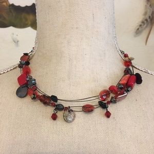 Red tones mixed material beaded fish line necklace